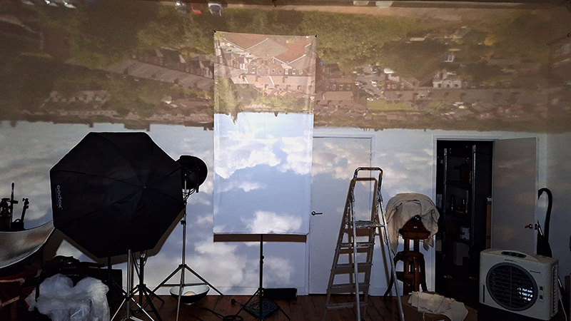Camera Obscura view over Leigh projected onto my studio wall, reflectors and studio clutter.