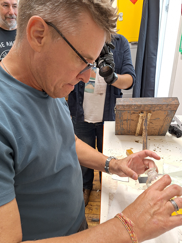 Shane pouring a tiny tintype.
