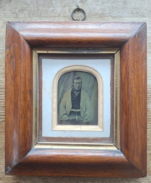 Framed quarter plate ambrotype of a tradesman